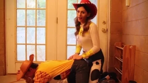 Cosplay toy Story tgirl Jessie pokes Woody